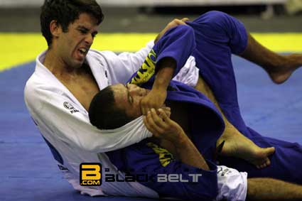 Felipe Costa taking the back of Ivaniel Oliveira